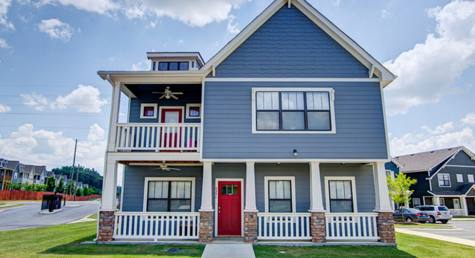 blue 2 story cottage house with red door. Links to blog about teal-time inspections.